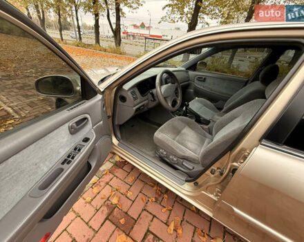Бежевий Кіа Маджентіс, об'ємом двигуна 2 л та пробігом 165 тис. км за 3900 $, фото 15 на Automoto.ua