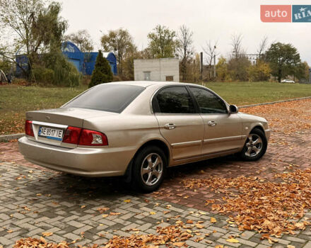 Бежевий Кіа Маджентіс, об'ємом двигуна 2 л та пробігом 165 тис. км за 3900 $, фото 8 на Automoto.ua