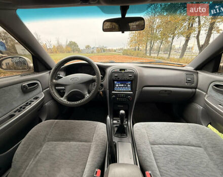 Бежевий Кіа Маджентіс, об'ємом двигуна 2 л та пробігом 165 тис. км за 3900 $, фото 18 на Automoto.ua