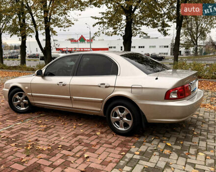 Бежевий Кіа Маджентіс, об'ємом двигуна 2 л та пробігом 165 тис. км за 3900 $, фото 10 на Automoto.ua