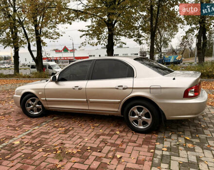 Бежевий Кіа Маджентіс, об'ємом двигуна 2 л та пробігом 165 тис. км за 3900 $, фото 11 на Automoto.ua