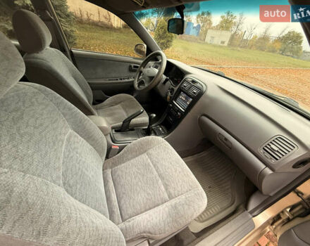 Бежевий Кіа Маджентіс, об'ємом двигуна 2 л та пробігом 165 тис. км за 3900 $, фото 20 на Automoto.ua