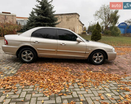 Бежевий Кіа Маджентіс, об'ємом двигуна 2 л та пробігом 165 тис. км за 3900 $, фото 13 на Automoto.ua