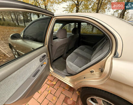 Бежевий Кіа Маджентіс, об'ємом двигуна 2 л та пробігом 165 тис. км за 3900 $, фото 16 на Automoto.ua