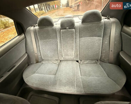 Бежевий Кіа Маджентіс, об'ємом двигуна 2 л та пробігом 165 тис. км за 3900 $, фото 23 на Automoto.ua