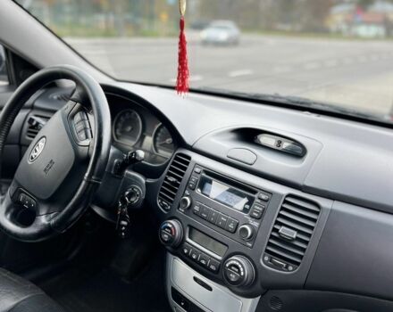 Чорний Кіа Маджентіс, об'ємом двигуна 2 л та пробігом 280 тис. км за 6450 $, фото 21 на Automoto.ua