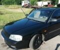 Черный Киа Маджентис, объемом двигателя 2.49 л и пробегом 235 тыс. км за 4000 $, фото 1 на Automoto.ua