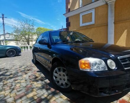 Чорний Кіа Маджентіс, об'ємом двигуна 2 л та пробігом 319 тис. км за 2500 $, фото 2 на Automoto.ua