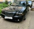 Черный Киа Маджентис, объемом двигателя 2 л и пробегом 257 тыс. км за 3500 $, фото 1 на Automoto.ua
