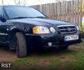 Черный Киа Маджентис, объемом двигателя 2 л и пробегом 273 тыс. км за 3400 $, фото 1 на Automoto.ua