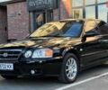 Черный Киа Маджентис, объемом двигателя 2 л и пробегом 223 тыс. км за 4400 $, фото 1 на Automoto.ua