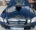 Черный Киа Маджентис, объемом двигателя 2 л и пробегом 75 тыс. км за 5700 $, фото 1 на Automoto.ua