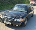 Чорний Кіа Маджентіс, об'ємом двигуна 2 л та пробігом 240 тис. км за 4700 $, фото 1 на Automoto.ua