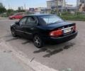 Чорний Кіа Маджентіс, об'ємом двигуна 1.99 л та пробігом 247 тис. км за 3500 $, фото 1 на Automoto.ua