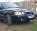 Черный Киа Маджентис, объемом двигателя 2 л и пробегом 273 тыс. км за 3100 $, фото 1 на Automoto.ua