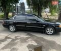 Черный Киа Маджентис, объемом двигателя 2 л и пробегом 72 тыс. км за 5600 $, фото 2 на Automoto.ua