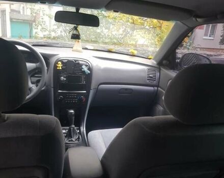 Киа Маджентис 2004 в Белой Церкве на Automoto.ua Черный Киа Маджентис, объемом двигателя 2 л и пробегом 200 тыс. км за 3000 $, фото 1 на Automoto.ua