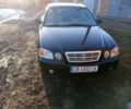 Черный Киа Маджентис, объемом двигателя 2 л и пробегом 320 тыс. км за 3500 $, фото 1 на Automoto.ua