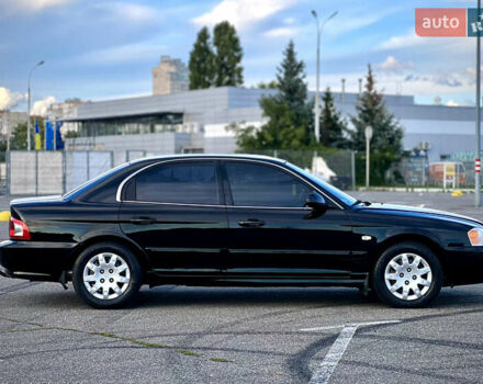 Черный Киа Маджентис, объемом двигателя 2 л и пробегом 222 тыс. км за 4000 $, фото 10 на Automoto.ua