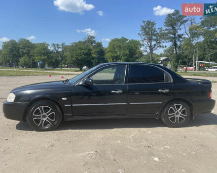 Черный Киа Маджентис, объемом двигателя 2 л и пробегом 350 тыс. км за 2900 $, фото 2 на Automoto.ua