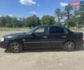 Черный Киа Маджентис, объемом двигателя 2 л и пробегом 350 тыс. км за 2900 $, фото 2 на Automoto.ua