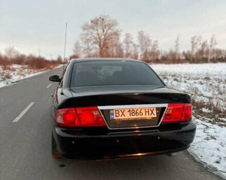 Черный Киа Маджентис, объемом двигателя 2 л и пробегом 303 тыс. км за 3699 $, фото 14 на Automoto.ua