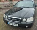 Черный Киа Маджентис, объемом двигателя 2 л и пробегом 289 тыс. км за 3800 $, фото 1 на Automoto.ua