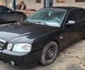 Черный Киа Маджентис, объемом двигателя 2 л и пробегом 210 тыс. км за 2699 $, фото 1 на Automoto.ua