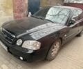 Черный Киа Маджентис, объемом двигателя 2 л и пробегом 161 тыс. км за 4750 $, фото 1 на Automoto.ua