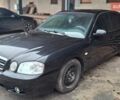 Черный Киа Маджентис, объемом двигателя 2 л и пробегом 206 тыс. км за 3500 $, фото 1 на Automoto.ua