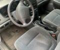 Черный Киа Маджентис, объемом двигателя 2 л и пробегом 161 тыс. км за 4750 $, фото 2 на Automoto.ua