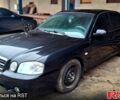 Чорний Кіа Маджентіс, об'ємом двигуна 2 л та пробігом 206 тис. км за 3900 $, фото 1 на Automoto.ua