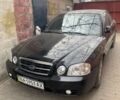 Черный Киа Маджентис, объемом двигателя 2 л и пробегом 161 тыс. км за 4600 $, фото 1 на Automoto.ua