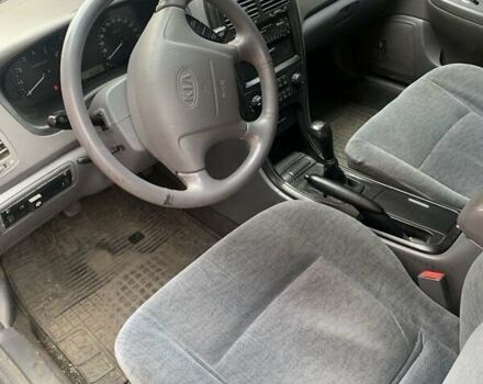 Черный Киа Маджентис, объемом двигателя 2 л и пробегом 161 тыс. км за 4800 $, фото 2 на Automoto.ua