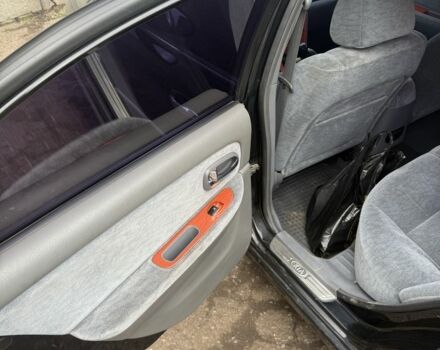 Чорний Кіа Маджентіс, об'ємом двигуна 2 л та пробігом 270 тис. км за 3296 $, фото 1 на Automoto.ua