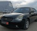 Чорний Кіа Маджентіс, об'ємом двигуна 2 л та пробігом 148 тис. км за 5450 $, фото 1 на Automoto.ua