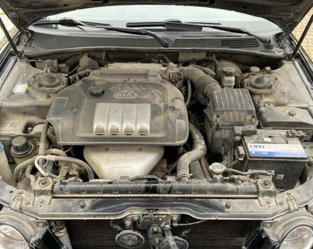 Чорний Кіа Маджентіс, об'ємом двигуна 2 л та пробігом 120 тис. км за 5800 $, фото 6 на Automoto.ua