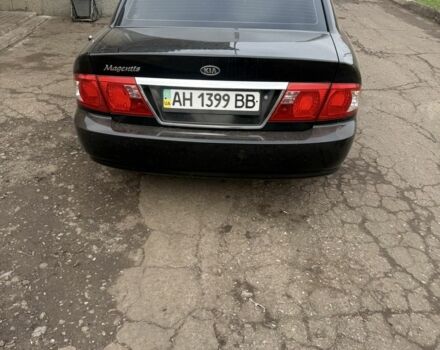 Чорний Кіа Маджентіс, об'ємом двигуна 2 л та пробігом 270 тис. км за 3296 $, фото 2 на Automoto.ua