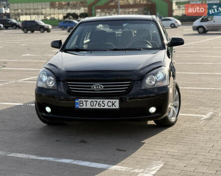 Черный Киа Маджентис, объемом двигателя 2 л и пробегом 260 тыс. км за 5400 $, фото 1 на Automoto.ua