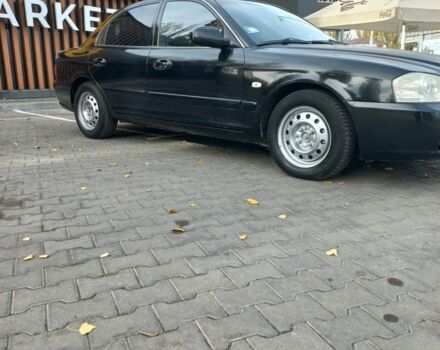 Чорний Кіа Маджентіс, об'ємом двигуна 2 л та пробігом 195 тис. км за 3500 $, фото 2 на Automoto.ua