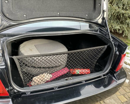 Чорний Кіа Маджентіс, об'ємом двигуна 2 л та пробігом 120 тис. км за 5800 $, фото 20 на Automoto.ua