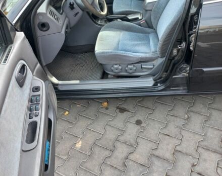 Чорний Кіа Маджентіс, об'ємом двигуна 2 л та пробігом 195 тис. км за 3500 $, фото 6 на Automoto.ua