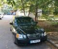 Черный Киа Маджентис, объемом двигателя 2 л и пробегом 223 тыс. км за 3800 $, фото 1 на Automoto.ua