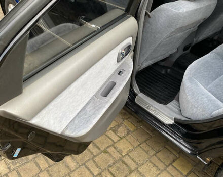 Чорний Кіа Маджентіс, об'ємом двигуна 2 л та пробігом 120 тис. км за 5800 $, фото 14 на Automoto.ua