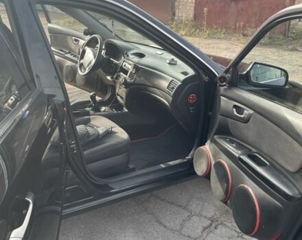 Чорний Кіа Маджентіс, об'ємом двигуна 2 л та пробігом 160 тис. км за 5900 $, фото 4 на Automoto.ua