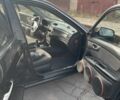 Чорний Кіа Маджентіс, об'ємом двигуна 2 л та пробігом 160 тис. км за 5900 $, фото 4 на Automoto.ua