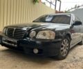 Черный Киа Маджентис, объемом двигателя 2 л и пробегом 240 тыс. км за 3450 $, фото 1 на Automoto.ua