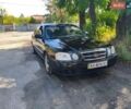 Черный Киа Маджентис, объемом двигателя 2 л и пробегом 261 тыс. км за 3350 $, фото 1 на Automoto.ua