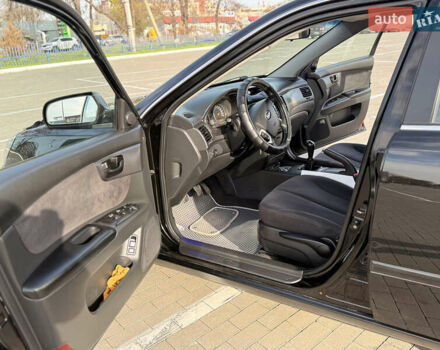 Черный Киа Маджентис, объемом двигателя 2 л и пробегом 260 тыс. км за 5400 $, фото 16 на Automoto.ua