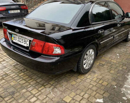 Чорний Кіа Маджентіс, об'ємом двигуна 2 л та пробігом 120 тис. км за 5800 $, фото 3 на Automoto.ua